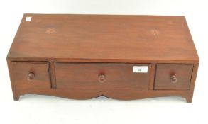 The base of a Mahogany dressing table mirror, with one long draw flanked by two smaller drawers,