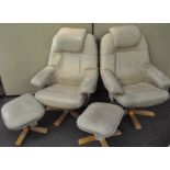Two Stressless style armchairs with original footstools,