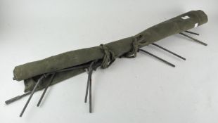 A military camp bed,