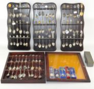 A large collection of collectors' teaspoons,