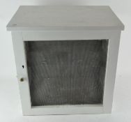 A Victorian white painted wooden meat safe with mesh front and sides,