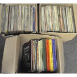 A large collection of vintage vinyl records, including jazz, pop, country,