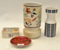 A Poole Pottery vase, Poole lidded box, Poole plate and a Hornsea vase,