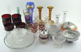 A large collection of assorted glassware, some coloured,