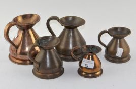 A group of five Victorian copper liqueur measures, including 1/8 Gill, 1/2 pint and 1 Gill,