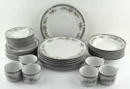 An eight piece dinner service by Royal Norfolk,