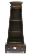 An unusual wooden ammunition holder/tiered unit of graduating form,