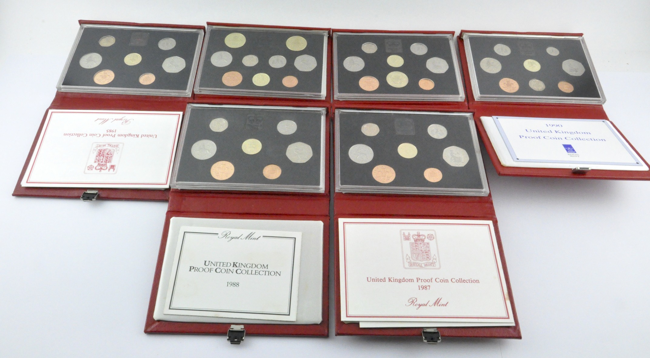 A collection of six British Coin proof sets,