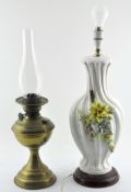 A 20th century brass oil lamp by Duplex, with glass funnel,