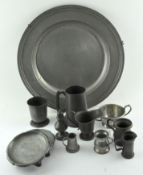 A pewter charger, 18th/19th century, and other items of pewter ware, including: tankards,