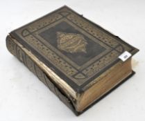 A large antique leather bound Holy Bible,