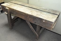 A vintage oak workshop bench,