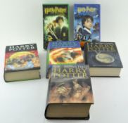 A collection of Harry Potter books,