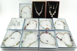 A selection of modern costume jewellery in gift boxes,