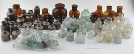 A collection of glass and ceramic bottles, including: Bovril and Marmite,