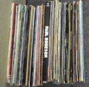 A collection of vinyl records, including Johnny Cash, Elvis, Barry Manilow, assorted pop,