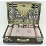 A Brexton 1960's cased picnic set, with floral ceramic tea-service,