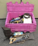 A collection of assorted tools to include a wire brush, hammer, wrench and more.