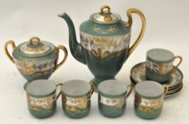 A part coffee service having gilt decoration,