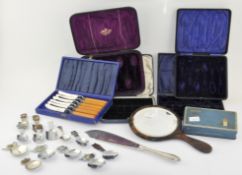 A collection of silver plated caddy spoons, together with numerous cutlery boxes,