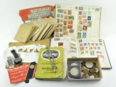 A selection of vintage stamps, some in albums; together with related emphemera,