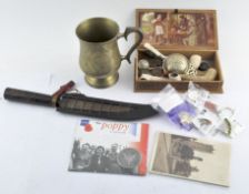 An assortment of collectables, including a GWR button, novelty lighter pen,