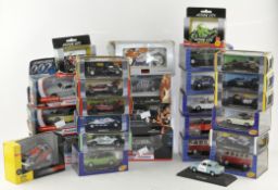 A collection of die cast model vehicles, including examples by Corgi, Premium Edition, Action City,