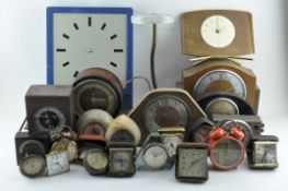 A collection of clocks and movements,