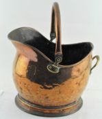 A brass coal scuttle,
