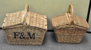 A Fortnum & Mason wicker picnic baskets with another