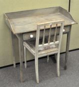 A vintage painted desk with matching chair, the desk with a single drawer to the front,