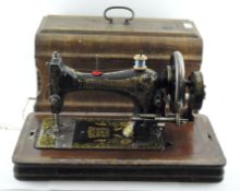 An early 20th century sewing machine by Frister and Rossman,
