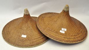 Two Oriental tourist wicker weaved sun hats,