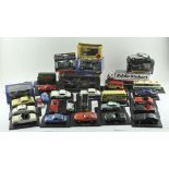 A selection of vintage die cast model vehicles, some mounted on stands,