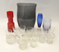 A collection of assorted glassware to include two modern signed vases,