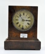 A late 19th/early 20th century walnut cased mantel clock with label to inside of door for "Camerer,