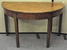 A mahogany part demi-lune table,