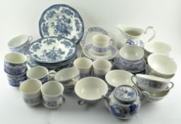 A collection of assorted ceramics, mostly blue and white,