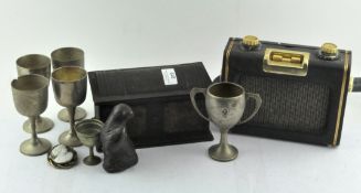 A mixed lot, including vintage radio, figure of an otter,