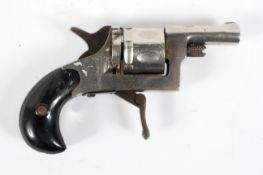 An articulated trigger revolving starting pistol, stamped Foreign,