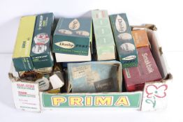 A collection of vintage Sports related advertising packaging and tins,