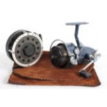Two Fishing Reels : Mitchell 440A fixed spool reel and a Mitchell automatic fly reel