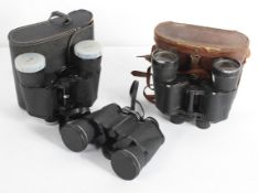 Three pairs of field binoculars, two being cased