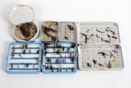 Four assorted fly boxes and flies, including: a vintage Perrine metal fly box,