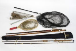 A selection of fishing rods and nets, including a Hardy example: comprising: four fishing nets,