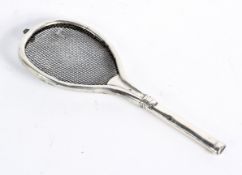 An unusual early 20th century tea strainer in the form of a Tennis racket,