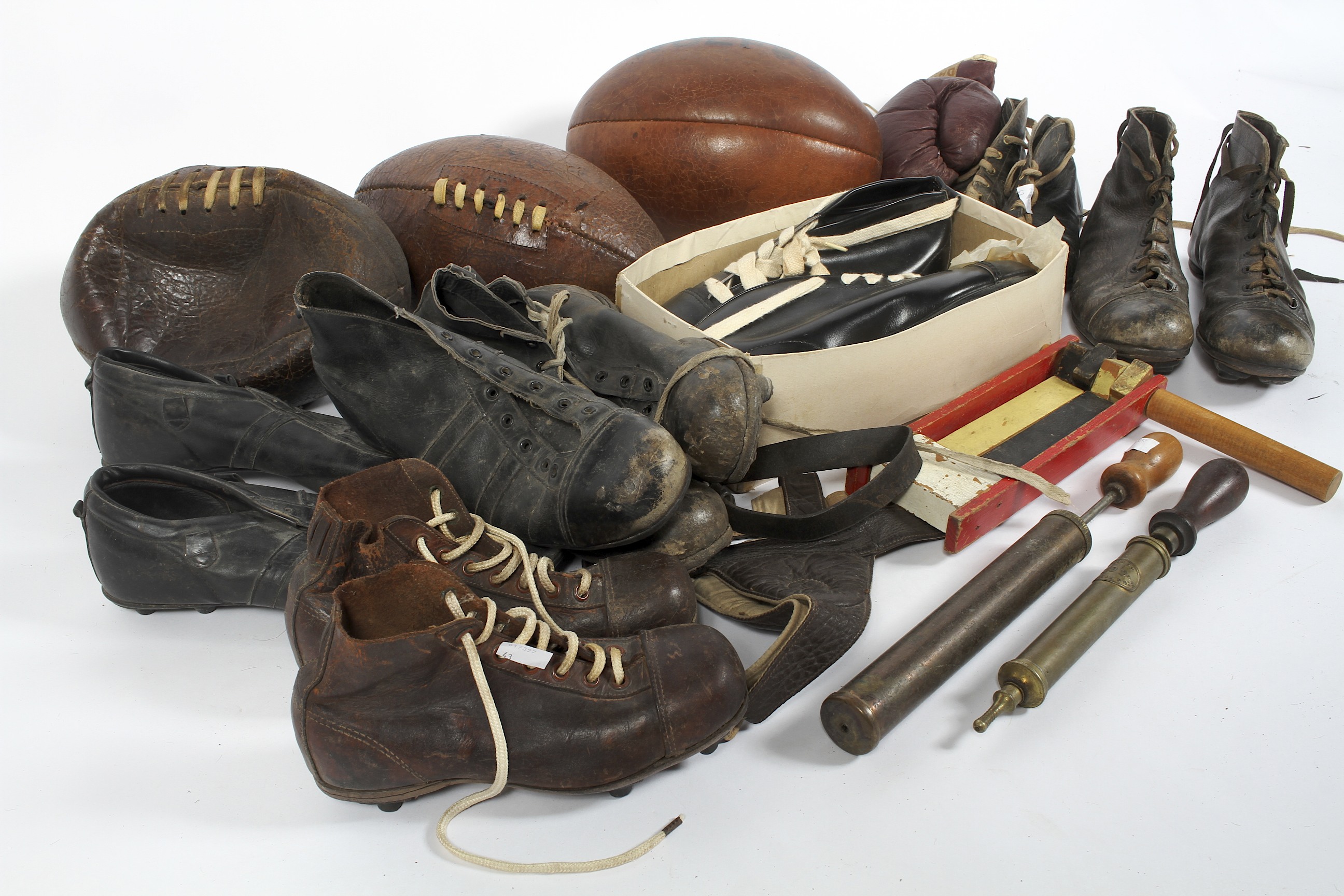 A collection of assorted early-mid 20th century sporting items, to include rugby balls, - Image 2 of 2