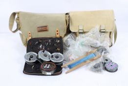 A quantity of fishing items, including Rimfly II reel and others, a leather bag with assorted flies,