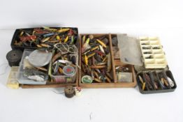 A large quantity of fishing lures, Minnows, plugs and spoons in wood,