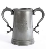 A pewter two-handled rowing trophy cup, engraved with Cains College, Senior Trial Eights,